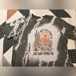 Tie dye “Ain’t going down til the sun comes up” western graphic tee
